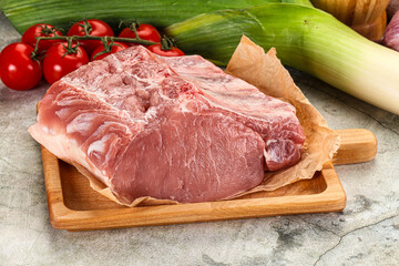 Raw pork loin cut with bone