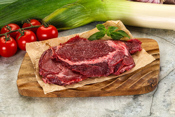 Raw beef cheeks cut for cooking