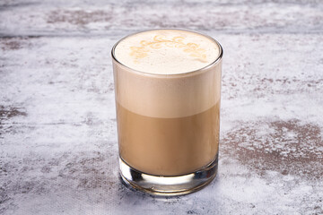 Hot latte beverage in the glass