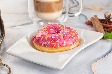 Sweet donut with strawberry icing