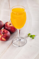 Vitamin beverage - peach juice glass