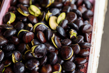 Close-up view of Djenkol beans in market