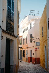 Colorful alley with shutters in Ciutadella, Menorca