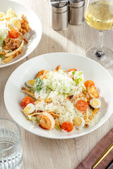 Caesar salad with shrimp and parmesan cheese