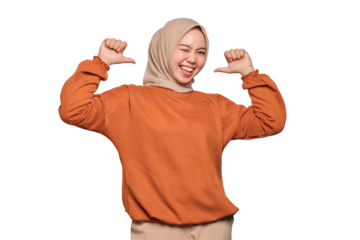 Cheerful young Asian woman in orange shirt pointing at herself with proud isolated on transparent background