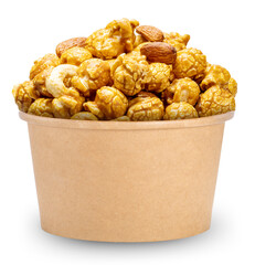 Caramel-coated popcorn with nuts, almonds, and cashew nuts in papper bucket Isolate on white background with clipping path.