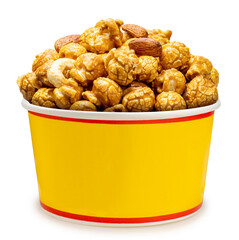 Caramel-coated popcorn with nuts, almonds, and cashew nuts in papper bucket Isolate on white background with clipping path.
