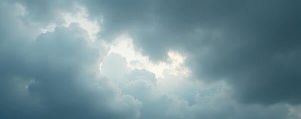Stark contrast, heavy grey sky with sparse white clouds , simple, aerial view