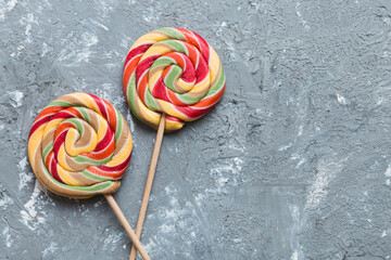 Set of colorful lollipops on colored background. Summer concept. Party Happy Birthday or Minimalist...