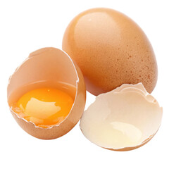Eggshells with broken pieces and a yolk inside, on a black background.