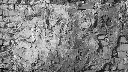 gray background, in the photo an old brick wall and cement