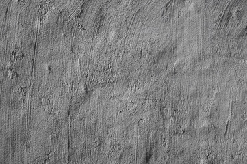 gray background, photo shows texture of gray wall close-up