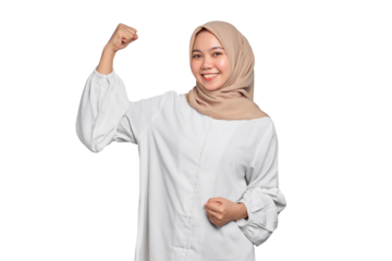 Smiling Asian Muslim woman raises arms and shows muscle isolated on transparent background