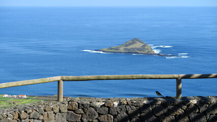 ilhéu da Praia is a basalt islet, made up of the dismantled remains of a coastal cone, with an...