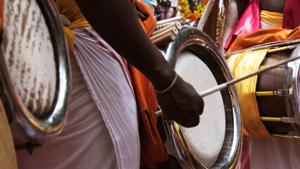 In a festival celebration, artists playing Thavil, a South Indian percussion musical instrument