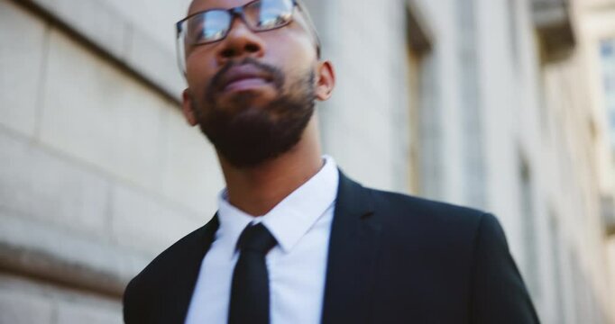 Walking, glasses and business black man in city for attorney, legal representative or professional. Corporate lawyer, solicitor or advisor with person outdoor for consultant and courtroom appointment