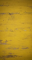 Obraz premium Golden Yellow Painted Wood Texture Background with Weathered Detail