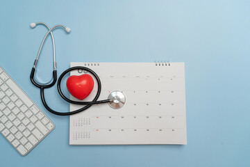 Medical, health care calendar, reminder, schedule or appointment concept. Close up top view on red...