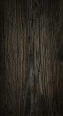 Naklejka premium Photo of Dark Wood Texture with Vertical Grain and Brown Tones