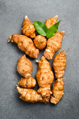 Fresh organic Jerusalem Artichoke root (Helianthus tuberosus). Top view.