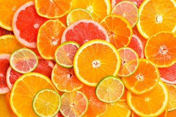Pattern of ripe citrus fruits. Close up.