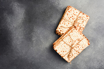 Passover celebration concept. Traditional ritual Jewish bread. On a gray concrete background.