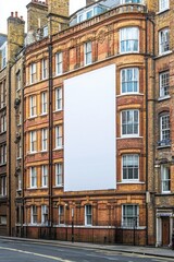 Naklejka premium Blank billboard on a historic building