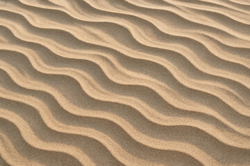 Golden Sand Texture with Wave Pattern Background