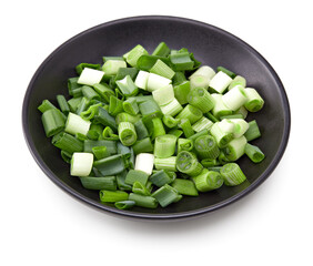 zest of onion in black plate isolated on white background. full depth of field. clipping path