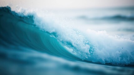 Obraz premium A mesmerizing turquoise ocean wave curls gracefully toward the viewer on a bright, serene day.