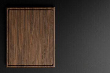 Fototapeta premium Empty wooden cutting board for preparing ingredients for preparing a delicious dish on black Countertop. Kitchen, 3d render 