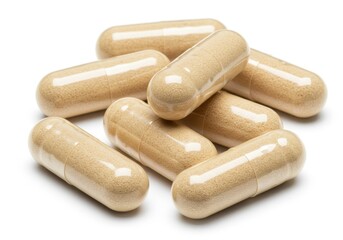 Pile of beige capsules on a white background, medical supplements and vitamins