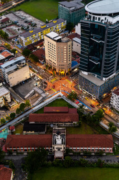 Urban block with contrasting buildings and rooftops, Kuala Lumpur, Malaysia