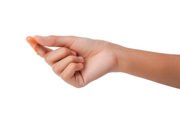 Close-up of a Hand with a small orange droplet on the fingertip, isolated on white background.