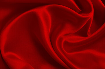 Dark red fabric texture background, detail of silk or linen pattern.