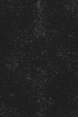 Distressed texture, retro dust and scratches overlay; grunge background for creating analogue film effect; worn-out, dusty dark scan of black paper