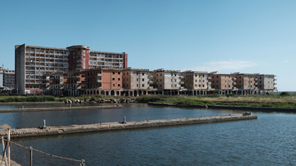 View of the river. Abandoned houses, degradation in Castel Volturno, Caserta - Italy