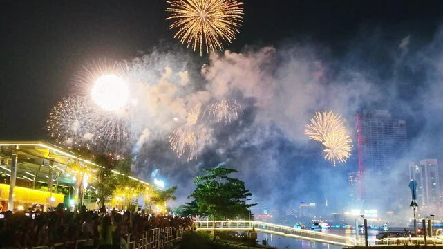 Fireworks display to celebrate the 50th anniversary of Vietnam's reunification. Beautiful night view cityscape. Holidays, independence day, New Year