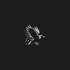 Flying crow logo with fragmented feather silhouette style.