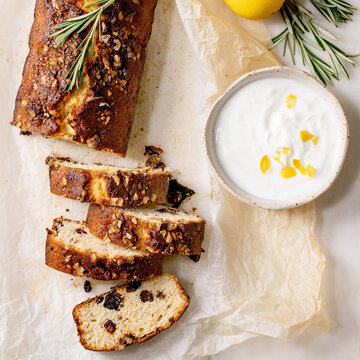 Homemade lemon cake with nuts and rosemary