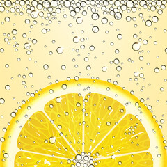 Lemonade with a Slice of Lemon and Bubbles