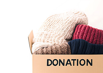 Donation box filled with warm winter clothing. A great way to give back this season and help those in need. Make a difference today!