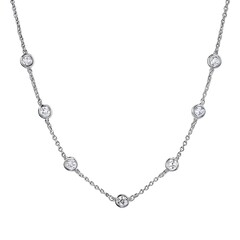Fototapeta premium Polished Diamond Station Necklace Bezel-Set Stones: Sparkle with Refined Craftsmanship and Timeless Luxury Appeal Exclusive