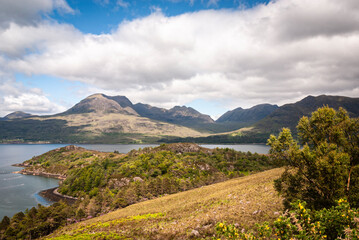 A summer, landscape HDR image of Beinn Alligin, a munro at the western end of the Torridon Mountains, Wester Ross, Scotland.