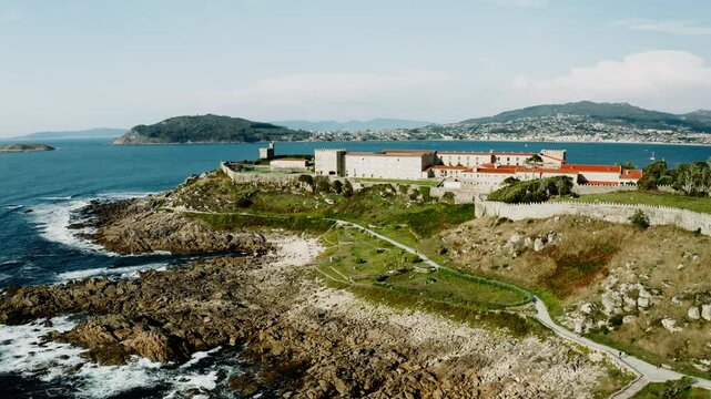 Aerial View Of Hotel Parador Inside Fortress Monterreal On Top Of Coastal Hill In Baiona, Galicia Spain