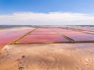 Aigues-Mortes, Camargue, France,  the largest mediterranean salt marshes in beautiful pink and red colors, for production of table salt  