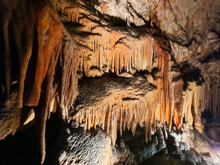 Jersey Cave at Yarrangobilly in the New South Wales Snowy Mountains Australia. Fantastic cave formations, stalactites, stalagmites and flow stone