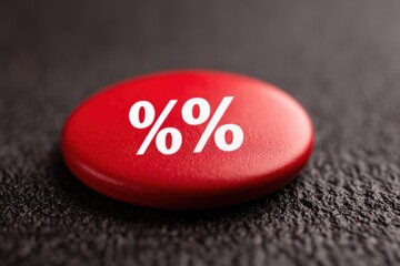 Bold red percentage button symbolizing discounts and promotions against a textured dark background showcasing financial trends and marketing strategies in retail environments