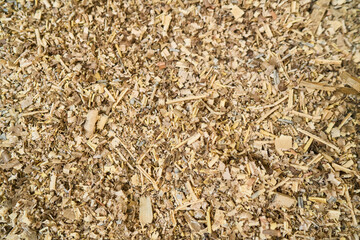 Close-up of wood shavings texture in a lumberyard setting