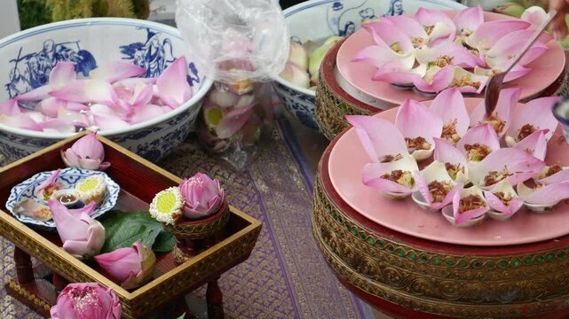 Making Miang Kham (traditional Southeast Asian herbal snack from Thailand and Laos), Traditional Thai snack. It&rsquo;s a snack containing different ingredients of herbs and vegetables. 